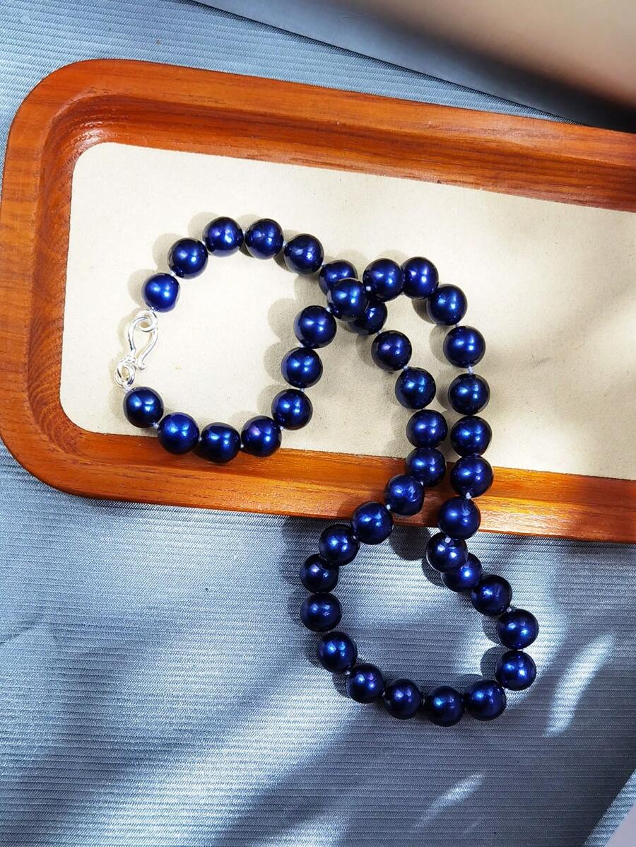 Tipo di stile:collana di perle coltivate