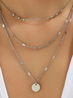 Colore:collana con disco in argento