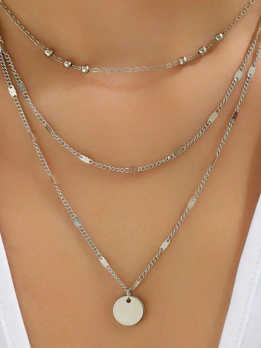 Colore:collana con disco in argento