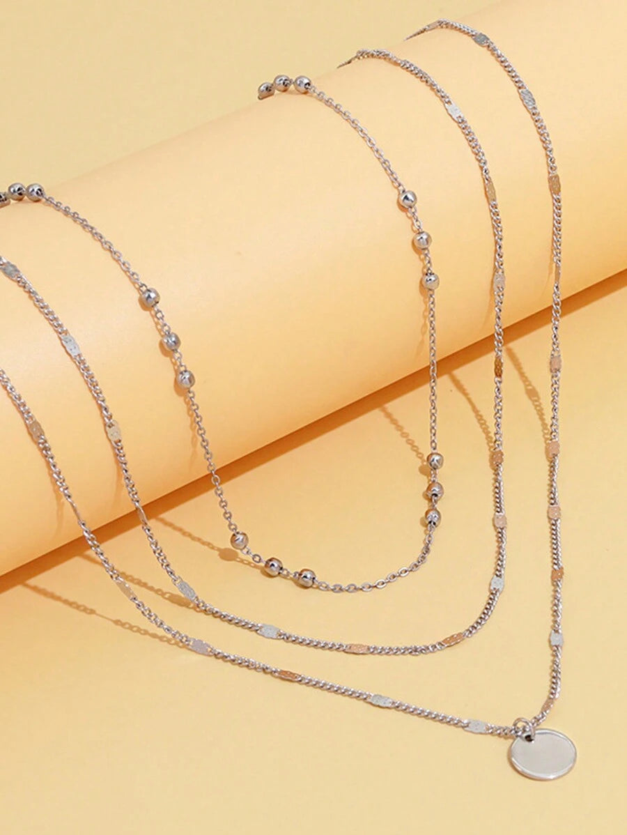Colore:collana con disco in argento