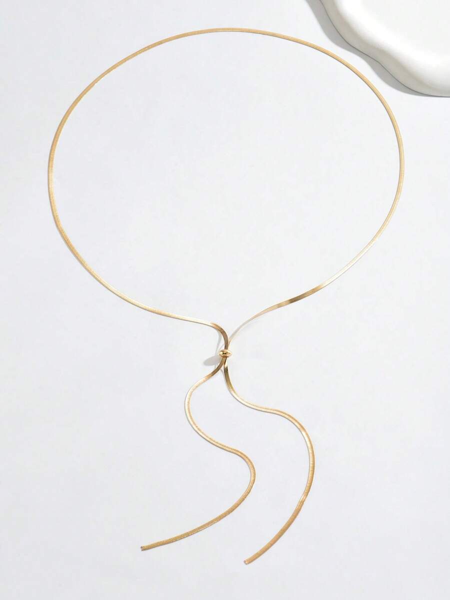 Colore:Collana in oro a forma di Y con osso di serpente