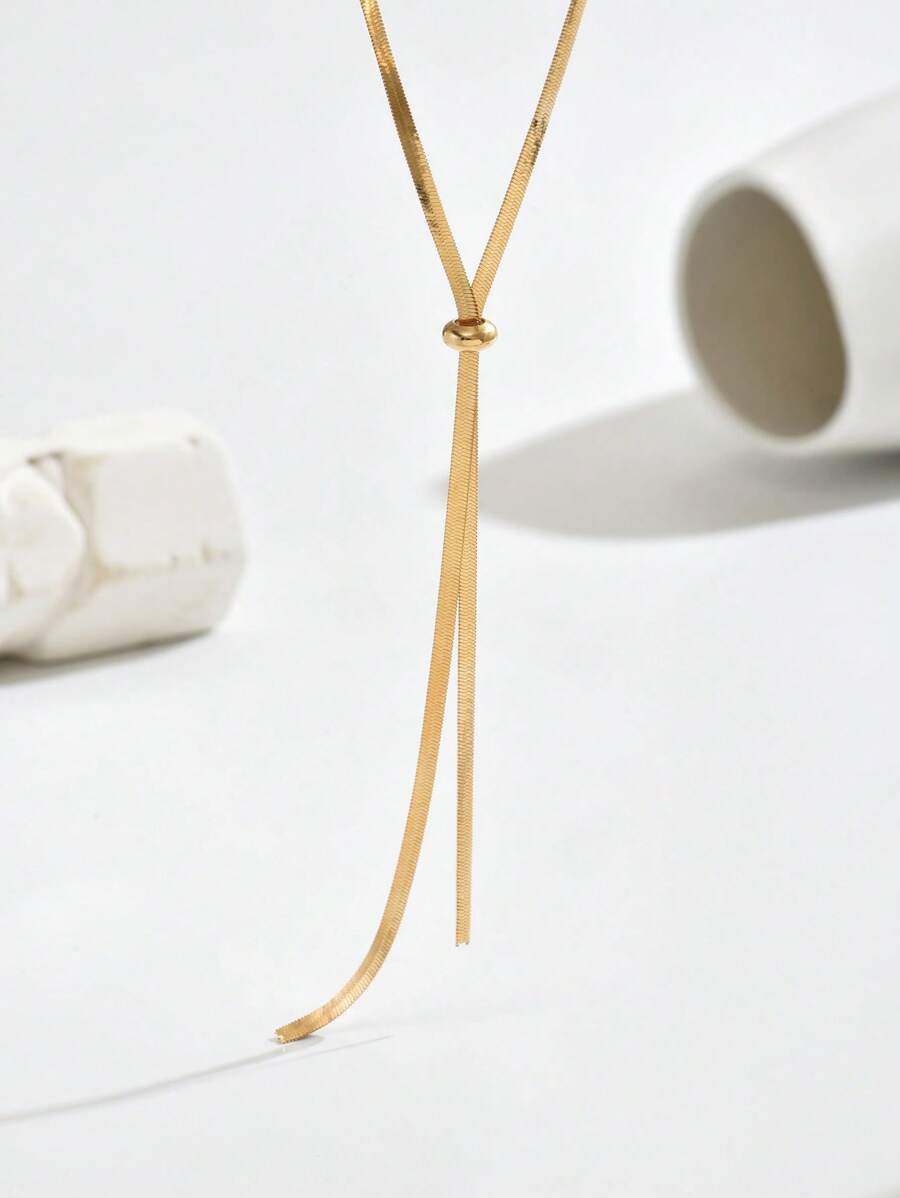 Colore:Collana in oro a forma di Y con osso di serpente