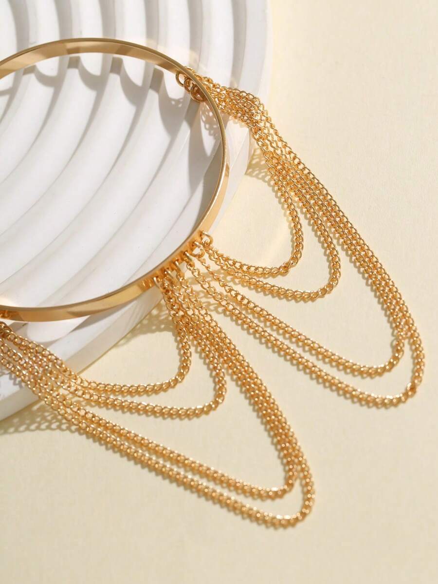 Colore:Bracciale con nappa dorata