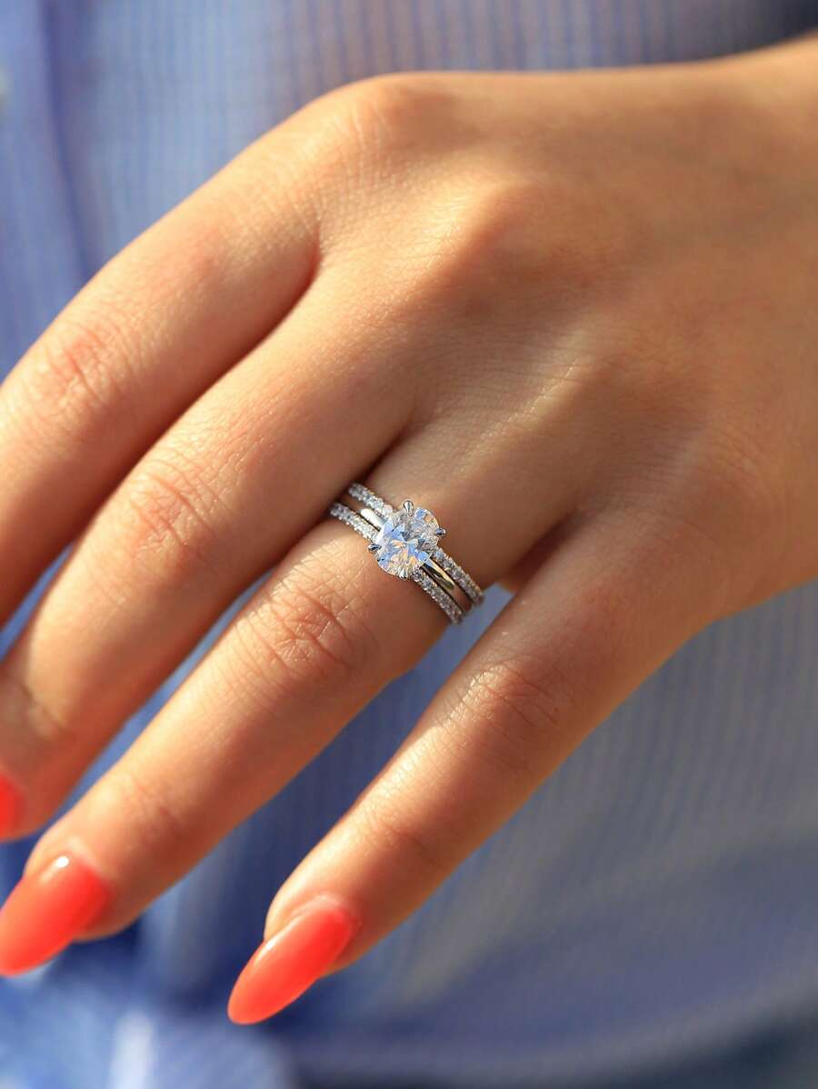 Tipo di stile:Anello a tre griffe con diamanti