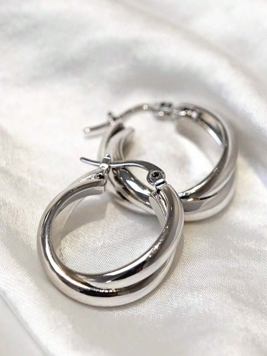Colore:Orecchini Mobius in argento