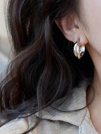 Colore:Orecchini Mobius in argento