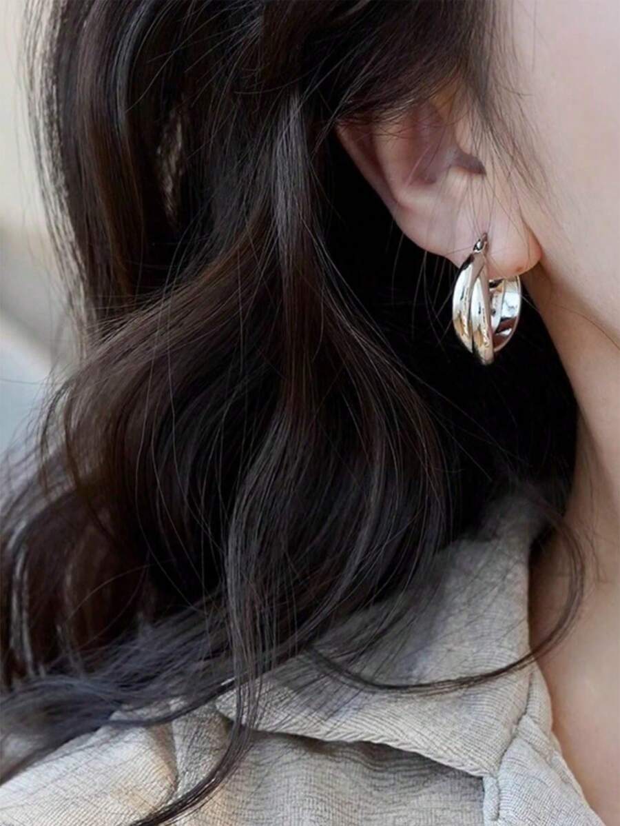 Colore:Orecchini Mobius in argento