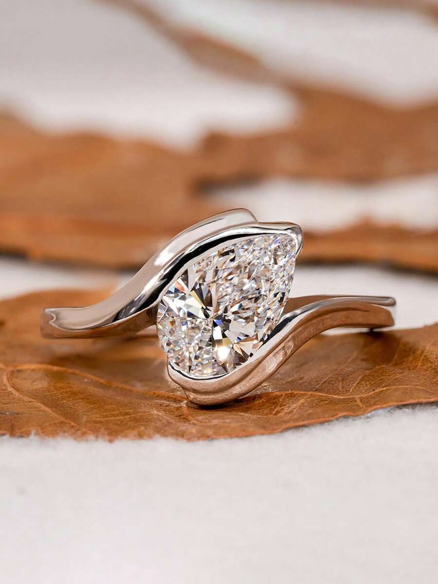 Tipo di stile:Anello a forma di goccia d'acqua con braccio attorcigliato