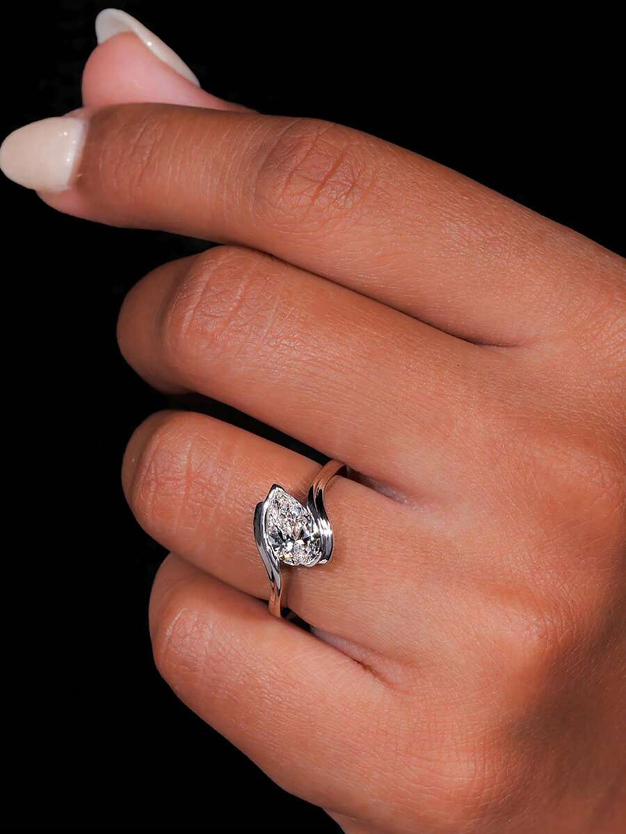 Tipo di stile:Anello a forma di goccia d'acqua con braccio attorcigliato
