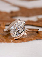 Tipo di stile:Anello a forma di goccia d'acqua con braccio attorcigliato