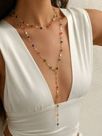 Colore:2 collane lunghe colorate