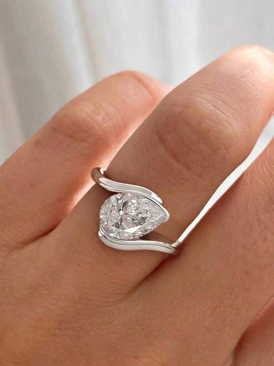 Tipo di stile:Anello a forma di goccia d'acqua con braccio attorcigliato