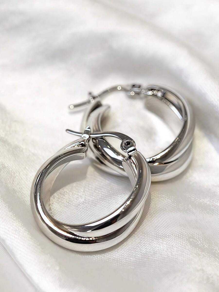 Colore:Orecchini Mobius in argento