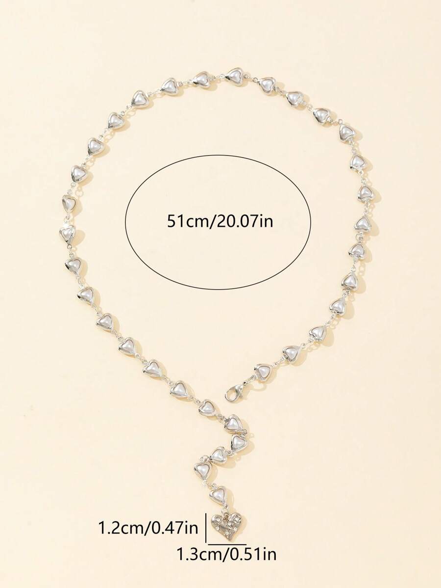 Colore:Ciondolo a forma di cuore in argento con perla
