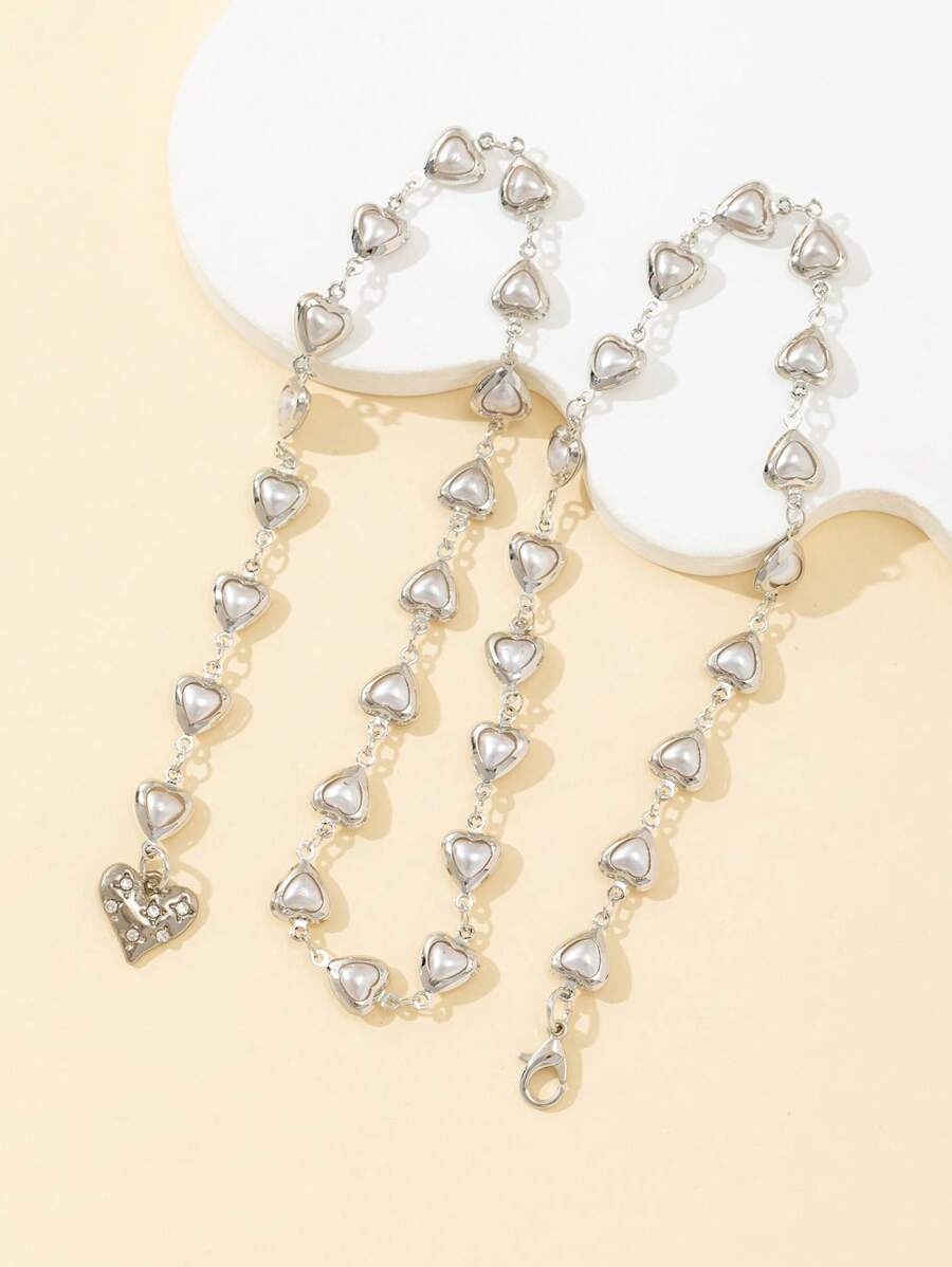 Colore:Ciondolo a forma di cuore in argento con perla