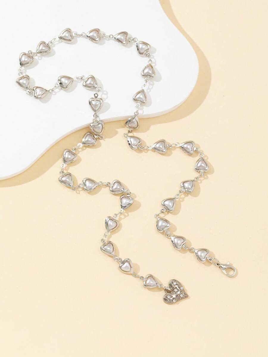 Colore:Ciondolo a forma di cuore in argento con perla