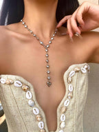 Colore:Ciondolo a forma di cuore in argento con perla