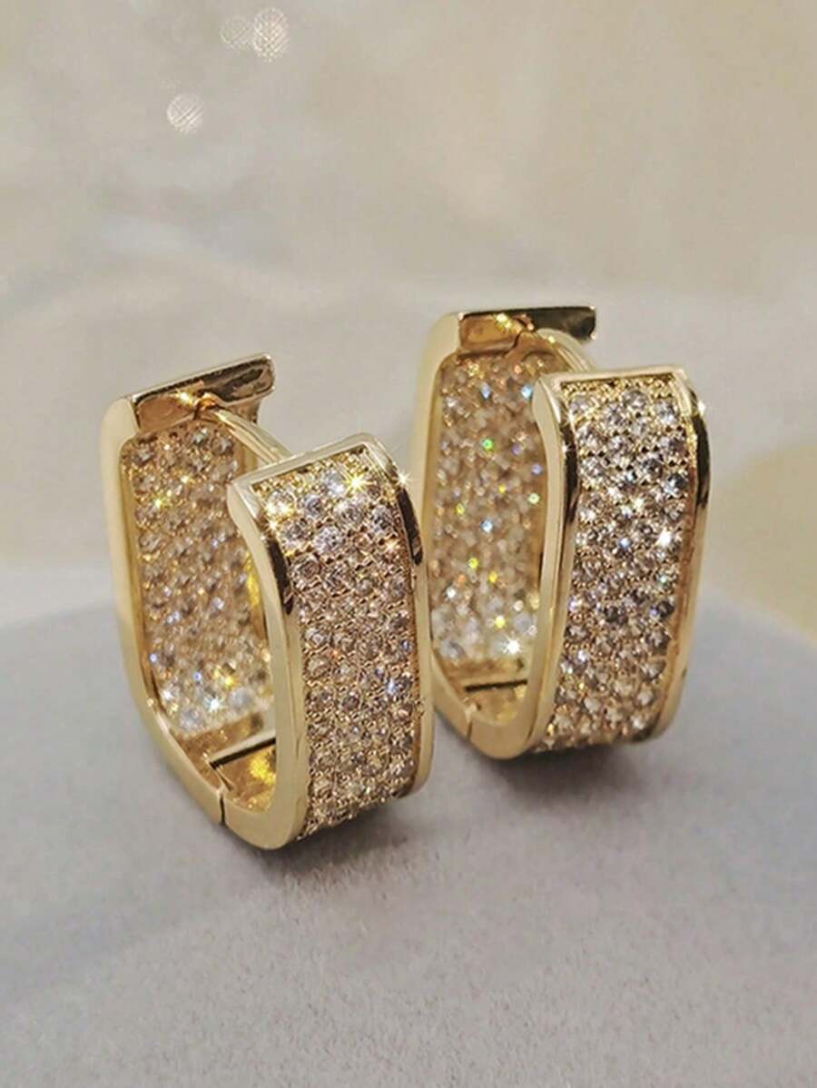 Colore:Orecchini a forma di U in oro con strass