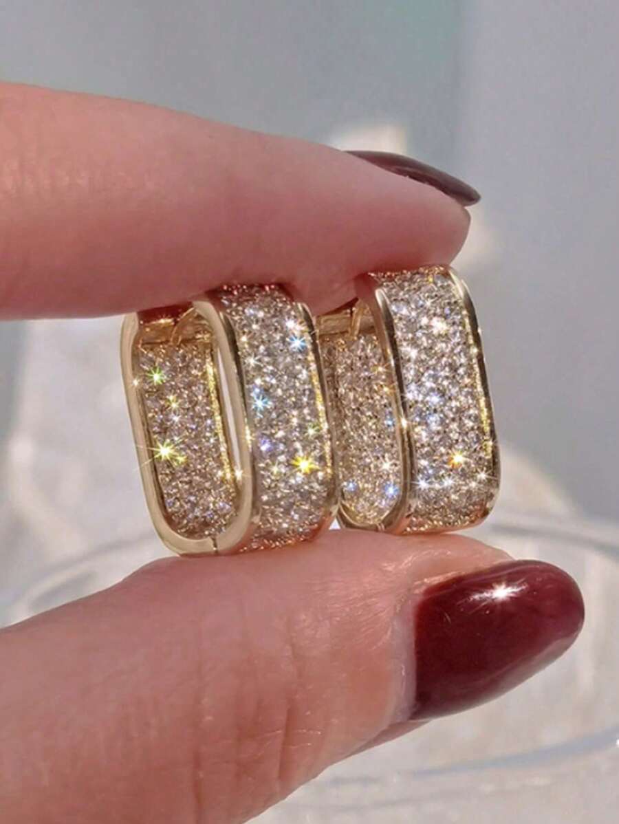 Colore:Orecchini a forma di U in oro con strass