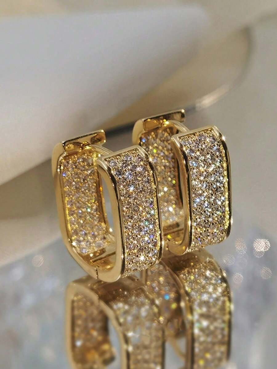 Colore:Orecchini a forma di U in oro con strass